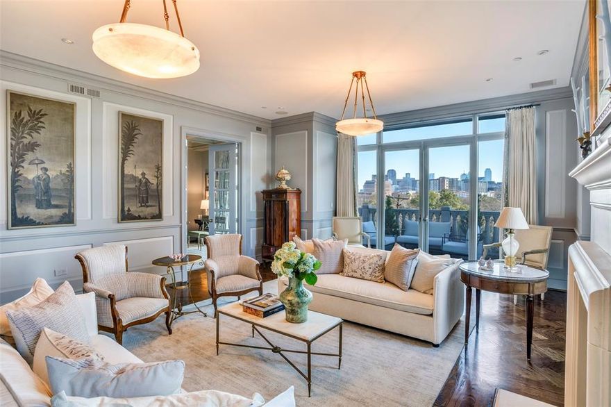 Beautifully reimagined by Lyn Muse Interiors, this extraordinary residence offers the finest in Dallas high-rise living. Stunning custom millwork, rich herringbone hardwood floors, and a dramatic marble entry with direct elevator access set the stage, complemented by floor-to-ceiling windows showcasing sweeping views of downtown Dallas and Turtle Creek Park. The formal living room features a striking natural stone fireplace.

The sun-filled breakfast room opens to a designer gourmet kitchen appointed with luxury appliances, a wine refrigerator, and access to its own private terrace. The spacious primary suite features dual marble baths and custom walk-in closets. French doors lead to a lovely study with an ensuite bath that can easily function as a third bedroom. A separate guest suite offers a private bath and a spacious walk-in closet.

Three reserved parking spaces (#196, #197, #304). Residents enjoy all amenities at The Vendome, including 24-hour valet and concierge service, a resort-style pool and cabanas, fitness center, owner’s library, L’Orangerie event room, three guest suites, dog park, and controlled building access.