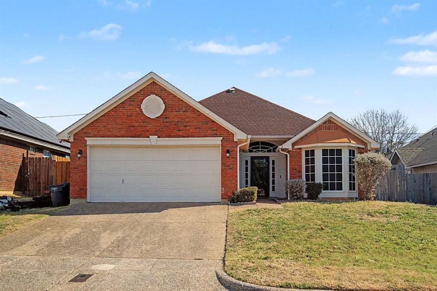 Welcome to this beautifully refreshed 3-bedroom, 2 bath single-story home offering approximately 1,710 sq ft of comfortable living in a quiet Fort Worth neighborhood. Thoughtful updates throughout make this home truly move-in ready. Step inside to find fresh interior paint, brand-new carpet in all bedrooms, and new 2 inch blinds that add a clean, modern touch. Every window features solar screens, enhancing energy efficiency and comfort year-round. The kitchen has been elevated with new stainless-steel appliances, a new sink, and a functional layout perfect for everyday cooking or entertaining. Nice size designated dining area open to the spacious living area.  Wood burning fireplace add a nice touch to the space. The secondary bathroom has also been updated with a new sink and cabinet, adding style and convenience. With its practical updates and inviting layout, this home is an ideal fit for anyone seeking a well-maintained property with some modern touches in a great location.