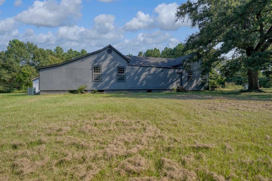 **Updated pictures now available** Discover a serene slice of East Texas living with this inviting 3-bedroom, 2-bathroom home offering 1,976 sq. ft. of comfortable living space on 1.448 acres. Combining the charm of country living with practical features for everyday life, this property is an ideal retreat for those who value space, privacy, and versatility.
As you arrive, you’re greeted by a spacious two-car carport that provides convenient covered parking. Inside, the home offers a warm, welcoming layout designed for both relaxation and entertainment. Generously sized living areas flow seamlessly from one to another, while abundant windows invite natural light and create a bright, airy feel. The kitchen and dining spaces are positioned to make mealtimes and gatherings easy, and the three bedrooms provide ample room for family, guests, or a home office. Two full bathrooms ensure comfort and functionality for everyone.
Outdoors, the possibilities are endless. The 1.448-acre lot offers plenty of room to spread out, garden, or simply enjoy the quiet of your own private space under wide Texas skies. Mature trees and open areas blend to create a balanced, picturesque setting.
A standout feature is the detached garage with workshop, perfect for hobbyists, DIY projects, or additional storage. Whether you need space for tools, vehicles, or creative pursuits, this versatile area expands your options and adds value.
This property combines the best of country charm and everyday convenience. With its generous acreage, functional layout, and bonus workshop space, it’s a blank canvas ready for your personal touch—whether you envision a cozy retreat, a bustling household, or a place to cultivate hobbies and outdoor living.
Embrace the opportunity to own a home that offers both comfort and flexibility in a beautiful, peaceful setting.