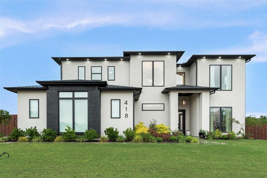 Welcome to a home that invites you to slow down, spread out, and truly enjoy where you live. Set on a generous 0.75 acre lot in Red Oak this home offers the rare combination of modern luxury and wide open breathing room, all wrapped into a beautifully designed 2023 built residence. From the moment you arrive, this home feels like a retreat from the pace of everyday life. Inside, 3,437 square feet of thoughtfully designed living space unfolds with soaring ceilings, abundant natural light, and an open, airy layout that makes both everyday living and entertaining feel effortless. The heart of the home is a stunning kitchen that naturally becomes the gathering place, featuring premium appliances, custom cabinetry, and a large island perfect for morning coffee, family meals, or hosting friends. The open concept living and dining areas flow seamlessly, creating a space that feels warm, connected, and welcoming. The primary suite is a true sanctuary, offering a peaceful escape at the end of the day with a spa inspired bathroom and an oversized walk in closet that feels more like a private dressing room. Three additional bedrooms, three and a half baths, and a dedicated home office provide flexibility for work, guests, and everyday life. Step outside and you will find room to breathe, play, garden, entertain, or simply enjoy the quiet. The fully fenced backyard, recently enhanced with a new wooden fence and gutters, is ready for everything from weekend gatherings to future outdoor living dreams. This is not just a home, it is a place to create a lifestyle. Quiet, refined, and thoughtfully designed, yet still close to the conveniences of the city, this is Red Oak living at its best.