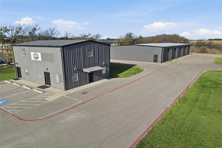 Prime US-377 frontage offering excellent visibility, traffic counts, and direct commercial access into Granbury’s highest growth corridor. The site includes ± 5,000 SF of heated, cooled and insulated warehouse-shop, separate conditioned office space with full upstairs living quarters, allowing both user occupancy and additional income opportunities. 
Granbury is among the fastest expanding areas in North Texas, capturing Fort Worth push-west demand, job growth, and residential
absorption. This corridor supports service industrial, flex, trades, automotive, fabrication, logistics, distribution, and
contractor HQ operations. The property sits minutes from the newly expanded Granbury Regional Airport, featuring a
5,200’ runway, new terminal building, increased fuel and hangar capacity, and growing corporate jet activity. Regional
infrastructure planning continues along US-377 widening, supporting freight movement and business attraction.
Surrounded by commercial momentum that includes retail expansion, new rooftops, and industrial development. Zoned
for versatile commercial use with room for fleet parking, storage yard, equipment, or future expansion. Owner-user
and investor compatible.