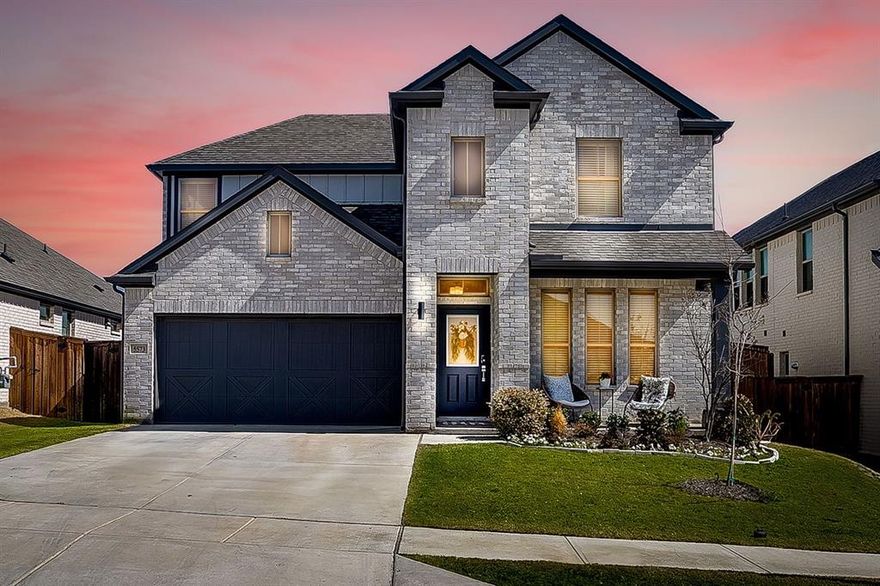 Nestled within Ventana, one of Fort Worth’s most lifestyle driven communities, this classic Trophy Homes residence built in 2022 blends thoughtful design, elevated style, and everyday comfort. Well positioned within the neighborhood, the home welcomes you with a charming front porch and an east-facing backyard with privacy, ideal for both relaxing and entertaining.
The light filled interior showcases a smart and flexible floorplan. The main level offers a serene primary suite, an additional bedroom and full bath, and an expansive great room perfect for connection and gatherings. The kitchen features an island, abundant workspace, and opens seamlessly to the spacious dining area. The adjoining living area is anchored by an ambiance fireplace, creating a warm and inviting focal point. Together, these spaces form a true great room perfect for entertaining. 
Upstairs, two additional bedrooms share a full bath and a secondary living space that works beautifully as a playroom, media room, or study area. Designer lighting, tasteful finishes, abundant natural light, and full foam encapsulation enhance both comfort and efficiency throughout.
Ventana is designed for active living. Residents enjoy sweeping views of Downtown Fort Worth and Benbrook Lake from two resort style pools, an open air pavilion, outdoor grilling and dining areas, an event lawn, Adventure Playground, and miles of scenic walking trails. The community is surrounded by recreation, including Benbrook Lake, WhiteStone Golf Club, and nearby city parks, with convenient access to shopping, dining, and entertainment.
Students attend the new Rolling Hills Elementary School located within the neighborhood. This home offers a rare combination of classic design, modern efficiency, and a vibrant community setting that truly elevates the way you live.