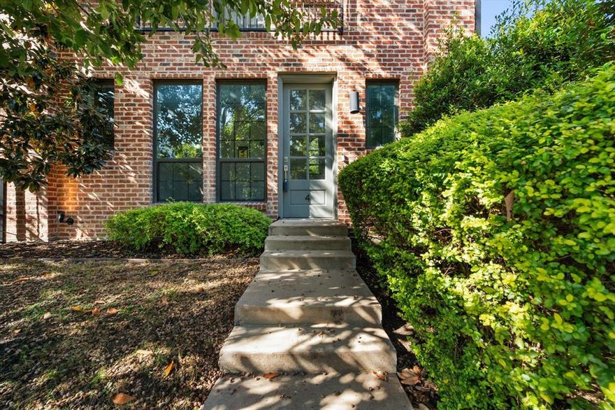 Step into stylish city living in this beautifully designed three-story condo featuring 2 bedrooms and 2.5 baths, perfectly positioned in one of Dallas’ most sought-after urban enclaves. This desirable corner residence offers added privacy along with a fenced front courtyard—ideal for pets or a cozy outdoor retreat. Inside, an inviting open-concept living and kitchen area welcomes you with warm natural light, rich flooring, and a sleek fireplace that anchors the space. The kitchen is thoughtfully appointed with custom cabinetry, quartz surfaces, a charming butcher-block dining nook, and stainless-steel appliances, making everyday cooking both effortless and enjoyable. The second-floor living level is crafted for entertaining and day-to-day comfort, offering generous room to relax, dine, and gather. Upstairs, the primary suite provides a peaceful escape with a spacious layout and a private bath designed for relaxation. A secondary bedroom with its own en-suite bath creates the perfect guest suite or flexible home office option. Capping off this exceptional home is an expansive rooftop deck, offering the perfect backdrop for morning coffee, evening conversations, or hosting friends while taking in dramatic Dallas skyline views. For fitness enthusiasts and outdoor lovers, the Katy Trail is just 8 minutes away, providing a scenic route for running, walking, or cycling. With a 2-car attached garage, contemporary finishes throughout, and a walkable location near premier dining, shopping, and entertainment districts, this lock-and-leave condo delivers modern elegance, convenience, and the vibrant lifestyle you’ve been searching for.