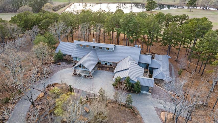 Welcome to this jaw dropping 173 acre EAST TEXAS RANCH! 2017 built 3BD,3.5BA 7,763 sqft home meticulously designed. Great room, a home theater, 2 living areas, mud room w dog wash! Open concept w stone FP, gorgeous bar, gourmet kitchen w WOLF range, SS appliances, grilling room, massive island. Split primary en suite w kitchenette, coffee bar spa like bath w shower, soaking tub. Guest bdrms have private baths. Oversized 2 car climate controlled garage with a pull through carport. Ready for livestock, w working pens, arena, stables, tack room, barns, 2 stock ponds, 1 lake, 12,000sqft barn w studio, shooting range and much MORE! Other outdoor amenities, multiple water and fire features, a rock garden, porch across the back of the house, private patios. Views of your lake, perfect for watching geese and sunsets! There is a 3bd 2ba house on property with separate entry. 2 hours east of DFW. Less than 45 minutes to Tyler or Longview. Call for additional pics, info and to schedule showing!