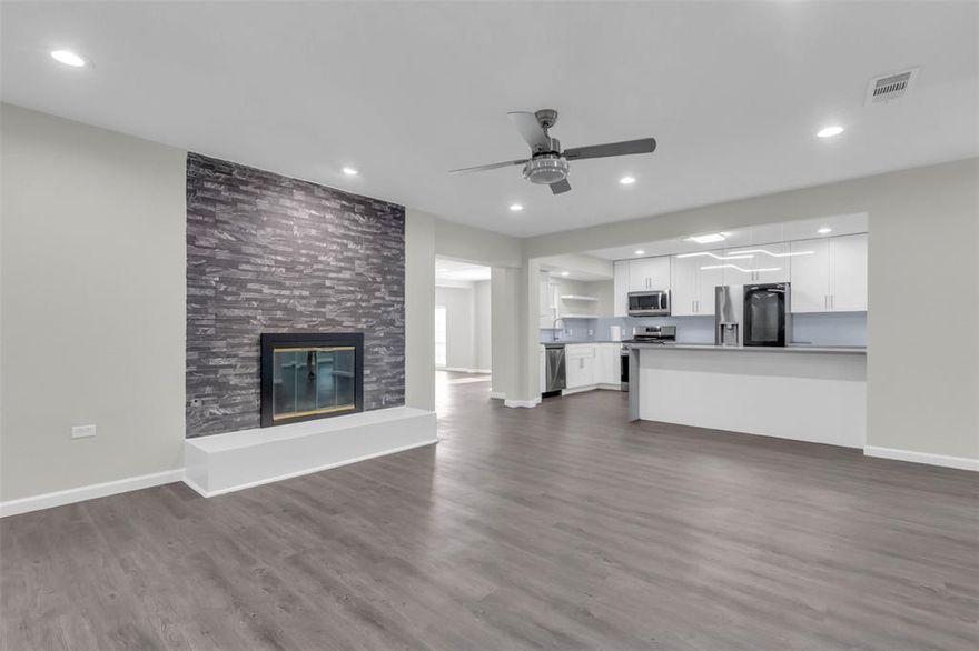 Welcome home to a beautifully refreshed and fully updated gem! Step inside to an open-concept floorplan that flows effortlessly from the updated stoned front entry into a bright, modern kitchen featuring updated cabinets, quartz countertops, stainless steel appliances, updated fixtures, and a spacious peninsula breakfast bar overlooking the main living area. A generous dining room sits just off the kitchen. The extra living room is a great flex space that provides endless possibilities—office, second living room, playroom, entertainment hub, or anything you imagine! The large primary suite is tucked at the back of the home and offers a walk-in closet and an updated bathroom. The other bedrooms are big and provide ample closet space. Enjoy a big backyard with a 7 foot+ tall fence for extra privacy. Located close to HWY 635 AND the tollway, getting around the city is a breeze from here!

Additional upgrades include fresh interior paint, heavily improved insulation, an updated HVAC system plus a split unit, an updated roof, and updated PVC plumbing under the house for long-term peace of mind. This home is truly move-in ready with updates from top to bottom!