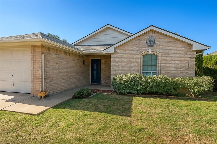 This home offers a comfortable and efficient living space featuring 3 bedrooms, 2 full baths and a one-car garage. Built in 2005, the home is in good conditions thoughtfully updated with solar panels, providing energy efficiency and long term savings. The roof was just replaced 1.5 years ago. The interior offers a functional layout and the exterior is perfect for outdoor relaxation or entertaining. This serene backyard features a spacious lower-level area surrounded by mature trees offering natural shade and privacy. A sturdy wooden staircase leads up to a deck. The yard is enclosed by a tall fence, providing added security and seclusion.