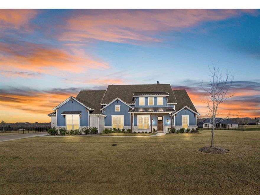 Welcome to luxury Texas living on a full acre in highly sought-after Gunter! This stunning single-story home offers 4 bedrooms, 3 full baths, a dedicated office, and a versatile media or game room that could easily serve as a 5th bedroom—each space thoughtfully designed with its own walk-in closet, including the office and media room.

Step inside to an open, inviting floor plan anchored by a gorgeous kitchen featuring an oversized island, double ovens, beautiful cabinetry, and an electric cooktop with a gas line already run—simply add a propane tank if you prefer cooking with gas. The spacious living room showcases a large stone wood-burning fireplace.

The private primary suite offers a spa-inspired bath with dual vanities, linen closet, soaking tub, large walk in closet and oversized walk-in shower

Enjoy quiet moments on the covered front porch—perfect for sweet tea in a rocking chair—or savor your morning coffee on the large covered back patio overlooking the expansive backyard. The home also features a spacious laundry room with beautiful tile flooring, a full wall of cabinetry, a folding counter, and a sink. All cabinets and drawers throughout the home are soft-close.

Loaded with thoughtful upgrades, including plantation shutters, electric shades in the living room, high-end carpet added after closing, and a wrought iron fence enclosing the backyard. The oversized garage features epoxy flooring, overhead storage racks, multiple additional outlets (including one dedicated for a fridge), and insulation in the walls, ceiling, and garage door. Additional insulation was also added between the game room and dining room, and between the living room and primary bedroom for enhanced comfort and sound control.

Outside, enjoy an extra-wide, extra-long driveway offering easy parking for multiple vehicles. With its spacious single-story layout, premium finishes, and one-acre lot, this home delivers both luxury and practicality—ready for its next owner to love.