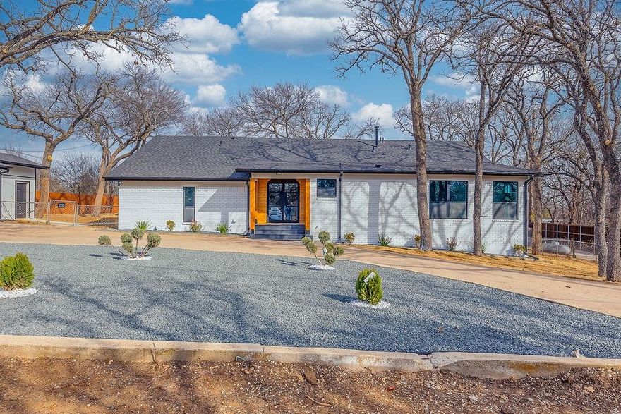 This is an incredible listing in the City of Keller, finding a full acre especially with a completely independent second residence is like finding a needle in a haystack. Its the ultimate Generational Living or Luxury Home Office setup.  Situated on a sprawling one acre lot, this masterfully renovated 2 story estate redefines modern luxury.  The main residence features an expansive open-concept design, boasting 6 spacious bedroom and 5 full bathroom in the main house. There are 4 bedrooms in the main house with it's own full baths, all finished with the highest caliber contemporary materials.  The chef's kitchen is a showpiece of form and function, featuring a stunning waterfall island, brand-new stainless appliances, custom cabinetry and equipped with a professional-grade pot filler.  Every inch of the home has been revitalized including new HVAC system, roofing, heating, designer flooring, walls and high-end fixtures throughout. Outside, the property offers unmatched versatility.  A grand circular driveway provides an elegant entrance, while a separate secondary driveway leads to the rear of the property. The crown jewel of this property is the fully functional, independent living quarters - complete with its own full kitchen and bath-perfect for guest, multi-generational living, or a premier home studio.  Two large over sized Garage and Storage, open shed measured at 36 X 26 can park 2 RV and the enclosed Double Door Garage measured at 50 X 29 can easily park 5 or more vehicles with additional space for workshop or storage.  The possibility for this property is just endless and the new owner can build additional structure to accommodate their future needs.   In the main house, there 3 appliances that runs on propane - Tankless water heater with 11.8 GPM, HVAC and Kitchen cooktop.  The In-Law Suite is all electric HVAC system with a 40 Gallon Electric Water.  These equipment are all brand new installed.