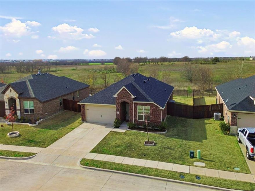 Welcome to this serene, inviting 4 bedroom, 2 bath residence nestled in the heart of Sanger. Thoughtfully designed with both comfort and functionality in mind, this home offers well-utilized living space, perfect for growing families or those who love to entertain. From the moment you step inside, you’ll appreciate the open concept layout and abundant natural light that creates a warm and welcoming atmosphere. The heart of the home is the inviting kitchen space, featuring a grand kitchen island, stainless steel appliances, and a large pantry ideal for weeknight dinners and weekend gatherings alike. The primary suite offers a private retreat with an en-suite bath complete with a separate shower, and garden tub, while the additional 3 bedrooms provide flexibility for kids’ rooms, an in home office, or guest space. Once outside enjoy the covered patio within the private backyard, sitting up against a greenbelt, perfect for BBQs, pets, and those much needed relaxing evenings. Located in the Sanger Circle neighborhood, residents enjoy the greenbelt, parks, and playgrounds, with convenient access to all things. This home is the perfect blend of comfort, charm, and convenience and ready to welcome its next chapter. Solar panels will be paid off at closing.