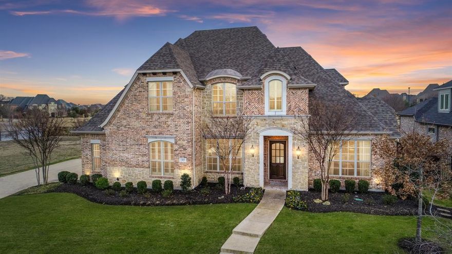 Easy living in Southlake,  highly sought after Carillon with easy access to Hwy 114. Minutes from Southlake Town Square with shopping, restaurants and entertainment. This home offers a great open floor plan with downstairs master, family room, dining rooms, guest suite, and office. Family room with vaulted beam ceiling that overlooks beautiful pool, spacious backyard and outdoor patio with fireplace. Open kitchen with large island, gas range, built in refrigerator, walk in pantry, great cabinet and counter space. The downstairs master has a sitting area overlooking pool, spacious bath with dual sinks, separate shower and tub, and large walk in closet. Upstairs there is a large living area, theater room and 3 additional bedrooms and 3 bathrooms. The community offers beautifully landscaped grounds, walking trails, ponds, play ground and community pool.