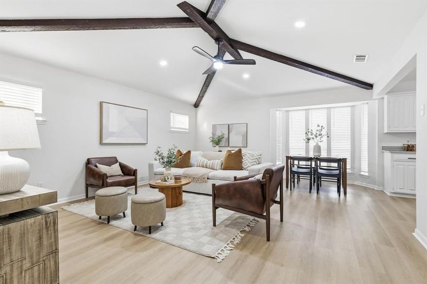 This renovated Cedar Hill home delivers modern updates, great space, and a prime location near Cedar Hill State Park, Joe Pool Lake, shopping, and major highways. The layout includes two large living areas—a vaulted room with wood beams and a bright bay window—along with a formal dining room and an updated galley kitchen featuring quartz-style granite, freshly painted cabinets, and new appliances.

The main areas feature new white-oak-tone LVP, and all four bedrooms have new carpet. Both bathrooms were completely redone. The primary suite includes a walk-in closet and a fully updated bath with a frameless glass shower, vertical tile, gold fixtures, granite counters, and a double-sink vanity. The hallway bath also has a new tub and tile surround, granite counters, refreshed cabinetry, and updated fixtures.

Major improvements include a new HVAC system, new water heater, updated doors and hardware, fresh interior and exterior paint, new lighting throughout, drywall repairs, new outlets and switches, new blinds, and a full professional clean. Exterior updates include landscaping cleanup, pressure washing, siding repairs, new house numbers, and updated exterior lighting.

Schedule your showing today!