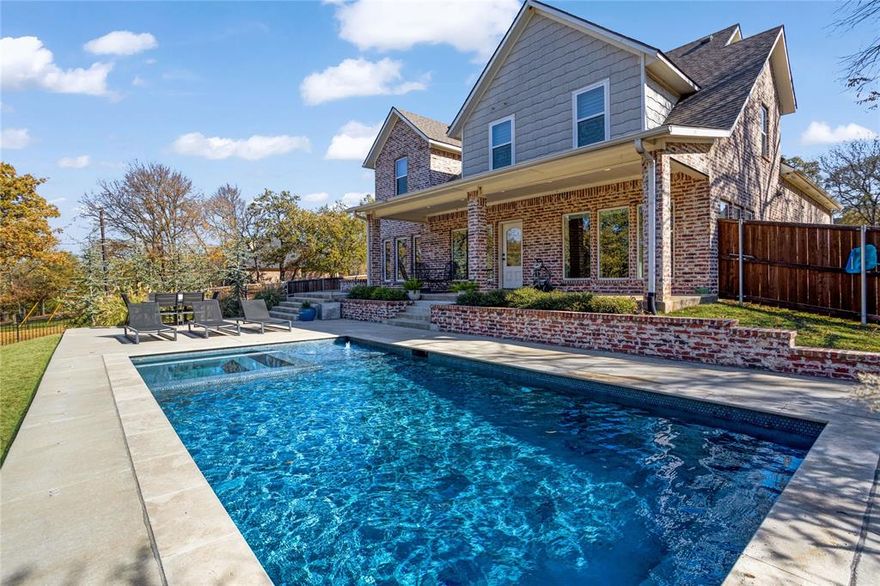 Immaculate Custom Home on One Acre in a tranquil setting. Discover this move-in-ready home nestled on a quiet cul-de-sac in a peaceful subdivision conveniently located between Denison and Sherman and 15 minutes to Lake Texoma . With 3,682 sq. ft. of living space, this family-friendly property offers everything you need for comfort and entertainment. The living area features custom built-ins, a cozy gas fireplace, and rich wood floors add warmth to the space. Step outside to enjoy a sparkling pool with a built-in heated spa , cozy gas pit area, and a covered patio overlooking wooded views, all within a fully fenced backyard for privacy and safety. Inside, the chef’s kitchen is a true delight, featuring abundant cabinet storage, granite countertops, and premium Stainless Steel Kitchen Aid gas appliances, including full-sized double ovens—perfect for entertaining. Downstairs living includes a beautiful master suite overlooking the backyard paradise with a garden tub, walk-in shower, double vanity and a large custom walk-in closet. Upstairs, you’ll find three spacious bedrooms, including an oversized ensuite that can serve as a second master suite, plus a large game room and a third full bathroom, making this home ideal for family living and entertaining. This property combines elegance, functionality, and a prime location—don’t miss your chance to make it yours! 

Buyer is responsible for a new survey and confirming property dimensions and square footage for accuracy.