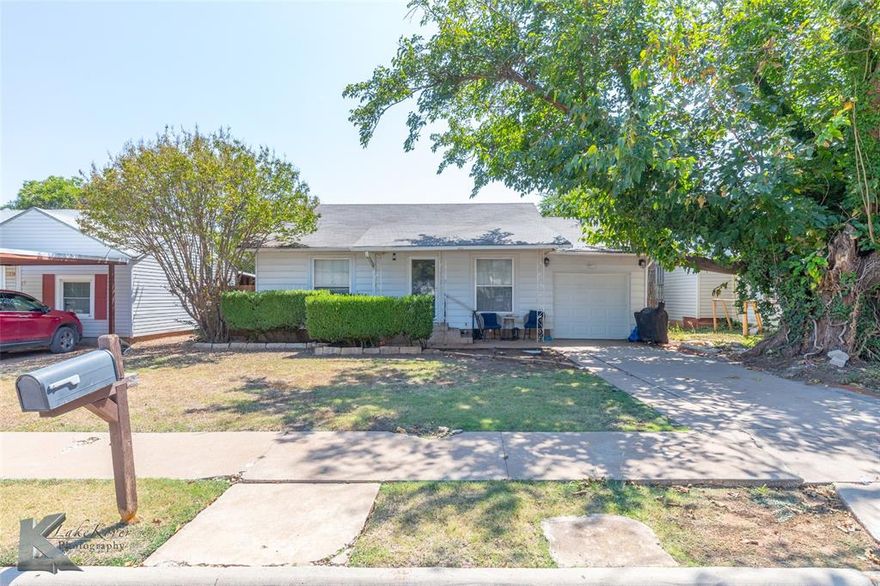 Charming 2 bedroom 1 bath home with a bonus flex room that could be used as a second living or a 3rd bedroom.  Features dining space, functional layout and a spacious backyard with endless potential.  Conveniently located near schools, shopping, and downtown Abilene!