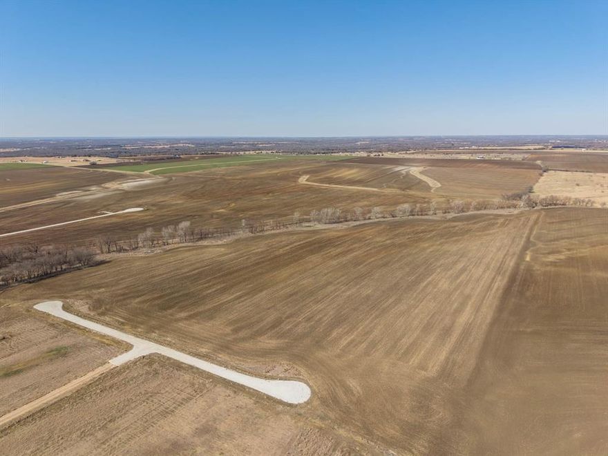 OWNER FINANCING AVAILABLE with only 7K down! Own your own piece of Texas with easy deed restrictions! Break away from the city and bring your livestock to this 12 plus acre tract with a creek and room to spread out. 800 sqft minimum build and mobile homes are allowed!  Located outside of the city limits but is less than 5 miles from downtown Hillsboro. City water already in place and electric will be accessible. Ag exemption in place and 4 tracts are available!