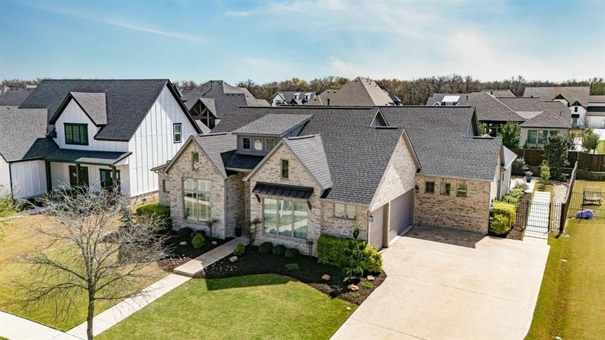 Welcome to this stunning, modern one story home located in sought-after 5T Ranch located minutes to Denton Country Club, top rated Argyle schools & major roads. This ideal floor plan offers an impressive extended foyer that leads to the light filled living room where a wall of windows showcases the backyard oasis. The living area flows into the bright kitchen that boasts quartz countertops, a large island, double ovens & a gas cooktop. The generous dining area can accommodate a large table for your gatherings.  Enjoy your favorite movies or sporting events in the cozy media room equipped with surround sound wiring & speakers. There is a private study located off the foyer with views to the front yard. The three way split bedrooms each feature a full bath offering privacy & the opportunity for multigenerational living. The serene primary suite offers views to the pool and features a spa-like bath with a huge walk-in shower, large soaking tub, his & hers vanities and a generous walk-in closet.  Just in time for summer fun, retreat to the resort style backyard where you will enjoy an extended covered patio, a sparkling pool with spa, & a cabana with a built in grill, flat screen TV wiring, a bar & leather granite countertops. Chilly outside?  Sit around the firepit & enjoy sharing stories with friends or just a quiet relaxing evening. This home is perfect for indoor & outdoor year round entertaining. Improvements include exquisite lighting fixtures, whole house surge protection, recent HVAC,  & plantation shutters  Almost one third acre of meticulously designed extensive landscaping that includes river rock beds, concrete paver walkways, and an abundance of thoughtfully positioned shrubs & trees. The family friendly neighborhood features a playground, a trail system that leads to Hilltop elementary & fun get togethers with your neighbors.