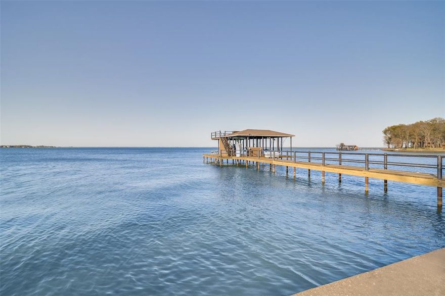 Unparalleled Waterfront Paradise – 2,046 SF Newly Constructed HOME & 900 SF 2-Bed 2-Bath CABIN plus Bunkhouse on 72+ Acres – Sleeps 20+

Step into a private lakeside sanctuary spanning 72+ acres, featuring over 2,000 ft of pristine shoreline and more than 2,000 ft of steel retaining wall. Two private docks, a covered pier with deep water for a large boat, one boat lift, two Jet Ski lifts, and swimming areas create the ultimate setting for boating, fishing, and waterside leisure.

Outdoor enthusiasts will relish premier hunting across the property, including deer, dove, duck, and hogs, with ample space for blinds, feeders, and trails -truly a sportsman’s paradise. Anglers will find a private haven on Richland-Chambers Lake, with world-class bass, crappie, catfish, and more. Cast from docks, pier, or wading areas, or venture onto deep water for the ultimate fishing experience.

Designed for entertaining and serene respite, the newly constructed 2-bedroom, 2-bath main residence (2024) features a grand loft, open living spaces, stone fireplace, and designer finishes. Expansive porches frame panoramic lake views, stunning sunsets, and tranquil sunrises. A separate 2-bed, 2-bath cabin with cedar accents and covered porches, plus a spacious bunkhouse, provide elegant accommodations for family, guests, or large gatherings.

With 71+ unrestricted acres and ag exemption to make your own, this estate offers unmatched privacy, prestige, and limitless recreational possibilities. Perfect for entertaining, family retreats, or executive getaways, it’s an exclusive setting for lakeside meetings, team-building, and secluded escapes; truly a rare masterpiece of lakefront living.

Experience the pinnacle of lakefront luxury; call today to schedule your private tour and step into this exceptional estate for yourself.
VIDEO link in transaction documents.