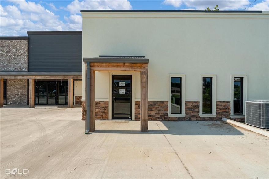 SPACE -C- will be new everything! Owner will build to suit. New Metal Roof added 2024.  New concrete parking lot with handicapped spaces.  There is a space reserved for your signage to be added to front of building.  Owner is a general contractor and will build out to meet your specs. (at a reduced cost) Restrooms and Small kitchen area will be shared with back tenants. Minimum 3 year lease.  Call today for your tour!  Owner is accepting deposits to hold your space.  Don't Miss Out!  HAUGHTON is GROWING!!