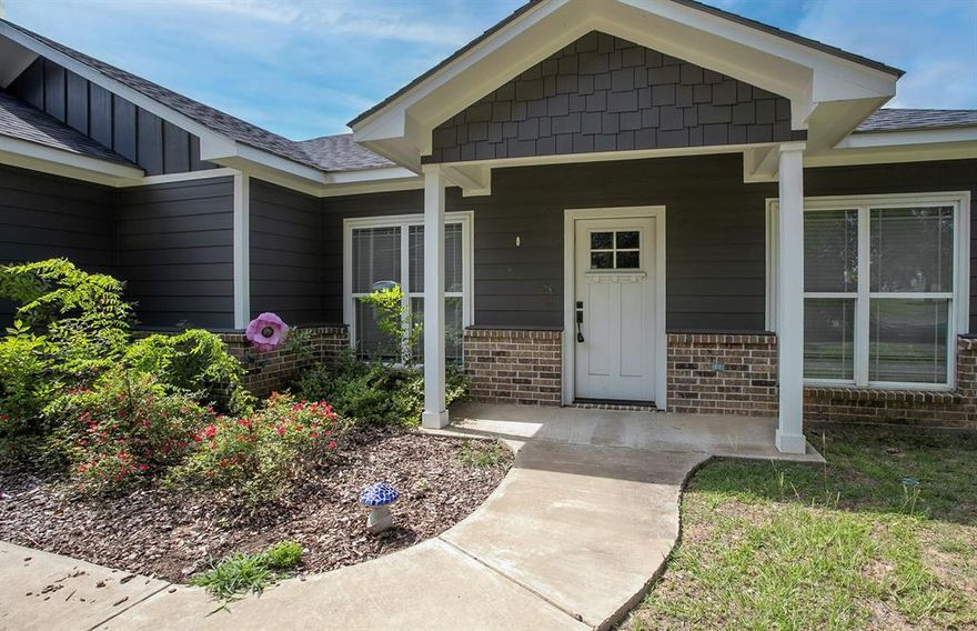 Discover this affordable home in the heart of Lindale, conveniently located on a corner lot within walking distance of downtown Lindale. This residence features an open floor plan, making it feel more spacious. The gorgeous kitchen boasts an island, granite counters, ample cabinet andcounter space, and a pantry. The living area is thoughtfully designed with wooden beams, a built-in entertainment center, and laminate flooring. This property offers you an opportunity to own a home in award winning LISD.