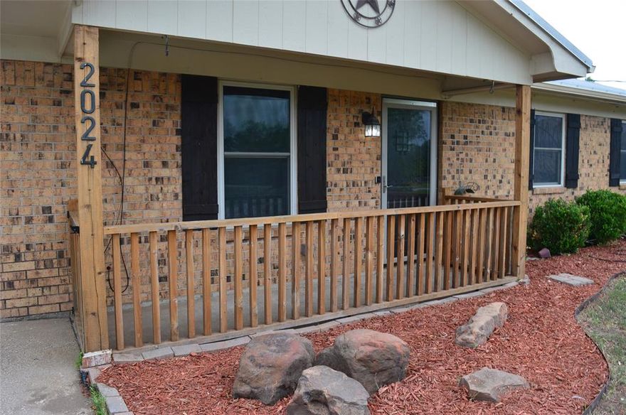 Very well-maintained home Southwestern style new landscaping, very energy efficient double pane windows that can be opened from the bottom or top window , Stainless steel appliances, Very Nice Whirlpool Stainless Steel refrigerator side by side doors with ice and water dispenser and bottom door freezer stays with the home. Great tall privacy fence with electronic gate that can be opened by remote or keypad.
New air-conditioning unit installed within the last two years, very nice 25x24 metal building with spray foam insulation recently built with multiple electric outlets, air lines installed with multiple air outlets in the shop and one on the outside front also a 20X24 covered carport attached to shop 10x24 lean-to on east side.
Very nice 12x24 outbuilding shed completely remodeled inside new floors, paneling full insulated with mini-split heating and air conditioning to keep you cool in the Summer and very warm in the Winer, two upper lofts, electric and lights also plumed for water to sink and toilet.
Stone fire pit next the shop.
All of this for comfort and very close Lake Grandbury boat ramps and the Brazos River.
