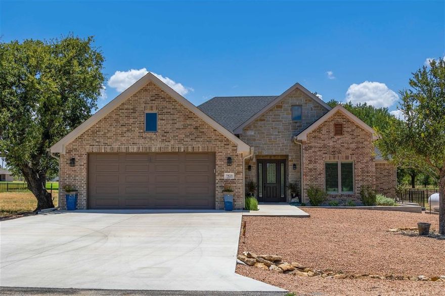 Newer One owner custom built home located between the 4th green and 5th tee box at The Hideout Resort on Lake Brownwood. This luxury home is like brand new and completely move in ready. Imagine no waiting time to build or landscape a home just move in and enjoy all the amity's included with the purchase the Hide Out Resort has to offer. Spacious open concept home with 3 bedroom 2 full baths and one half bath. The living room is open the the kitchen and boasts 10' ceiling throughout the home. The gourmet kitchen has lots of cabinets with quartz counter tops throughout, pantry with stainless appliances and oversized kitchen island making entertaining a breeze. The dining area is convenient to the kitchen with beautiful views of the golf course through the homes Pella windows. The master bedroom is a highlight with electric shades large bathroom with garden tub walk in tile shower and oversized closet that leads to utility room. Enjoy the back yard from the covered back porch and pergola.