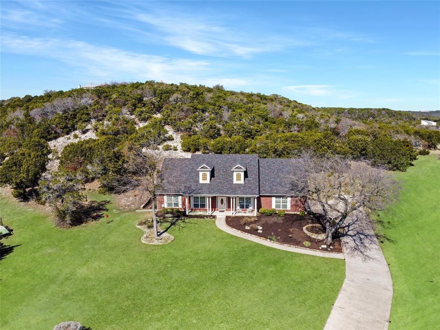Stunning North Texas Hill Country Home with 360° Views in The Retreat Golf Community.  Welcome to your hill country getaway in Cleburne! This beautiful custom single-story home sits on a quiet cul-de-sac in the award-winning Retreat Golf Club. The drive in winds through rolling hills, cliffs, and nature.  It creates an incredible impression every time you come home.

Inside, you’ll find a flexible layout with a spacious living area, chef-inspired kitchen, and an inviting dining room perfect for entertaining. There are actually two options for your dining area.  You have a private dining room with a view or you can use that room as another living space and then place your dining in the large open living space. The huge laundry and utility room adds extra convenience and storage.

The primary suite offers plenty of space to relax along with direct access to your private patio and nature view, while the secondary bedrooms ensure guests feel right at home. A private office near the entry provides a great space for work or hobbies.

Enjoy outdoor living surrounded by nature! The large, private yard is ideal for relaxing or watching deer and birds. The side-entry garage and extended driveway add both curb appeal and functionality.

Life at The Retreat Golf Club is packed with amenities: 18-hole championship golf course, pickleball, two pools, fitness center, hiking and biking trails, playground, book club, men’s and ladies’ golf groups, tournaments, and excellent dining at the clubhouse.

Golf community membership initiation fee is included with the sale!

Come see this beautiful home and explore all The Retreat has to offer—schedule your tour today!