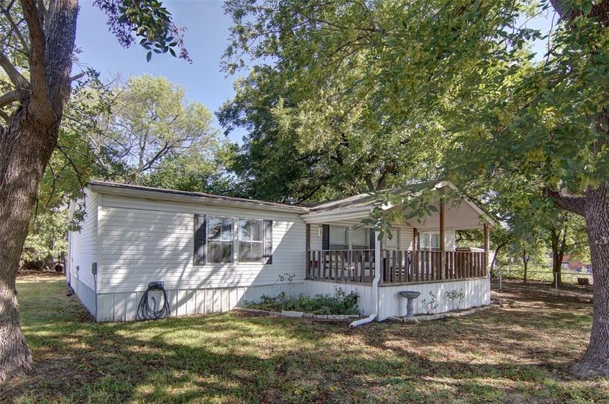 Charming 3 Bedroom, 2 Bath Home in Graford

This spacious double-wide offers comfort and convenience in a prime location—just a short walk to Graford ISD. Featuring 3 bedrooms and 2 full baths, the home provides a functional layout perfect for families or anyone looking for small-town living.

Step outside to enjoy the beautiful mature trees that provide shade and character, along with a chain-link fenced yard ideal for pets, kids, or a garden. The property combines the privacy of a quiet neighborhood with the convenience of being close to schools and town amenities.

Whether you’re looking for your first home, an investment, or a place to downsize, this one checks all the boxes.