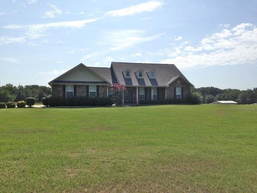 Beautiful property surrounded by oak trees and open land in the country. Built in 2005 this home is immaculate and features hardwood floors, gas cooktops and fireplace, vaulted ceilings, walk in closets and so much more. Additional acreage and horse barn negotiable. Must see to appreciate.