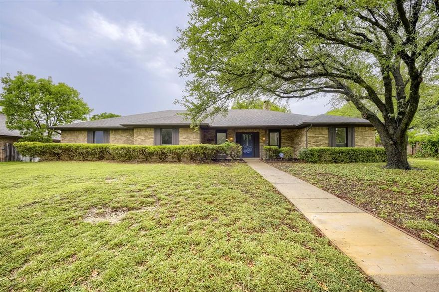 Beautiful brick ranch in the heart of Duncanville offering generous living space and a large, tree-shaded yard. This 4-bedroom, 3-bath home features a spacious main living area centered around a stunning floor-to-ceiling fireplace, creating a warm and inviting focal point. The updated kitchen includes stone countertops and a functional layout ideal for everyday cooking or entertaining. With multiple living spaces, great natural light, and a comfortable flow, the home provides room for everyone. The expansive backyard with established trees offers privacy and plenty of outdoor potential. Conveniently located near schools, shopping, and restaurants, this property combines space, comfort, and a prime location.