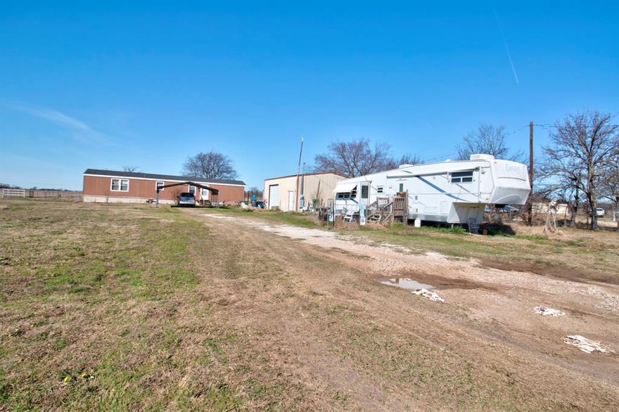 Located just a hop, skip and a jump from Downtown Whitesboro is this 2 bedroom 2 bath singlewide on almost one acre. Built in 2010, this will make a perfect starter home for those who want a little country living! Bring your ideas and creative mind set with you while touring this property.