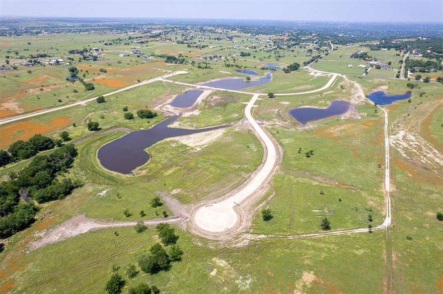 Come & build your dream home on this beautiful lot in the highly sought after Aledo ISD! Ideally located just 15 minutes to Fort Worth, 15 minutes to downtown Weatherford and 30 minutes to DFW Airport. This property offers a unique blend of natural landscapes with beautiful water features, rolling terrain, and various elevations, presenting a perfect canvas for your dream home. The property's topography provides a picturesque base for designing a home that fully utilizes the natural contours and panoramic views of the property.  AT&T Internet being installed.  Propane tanks must be buried to keep the property uncluttered.

With its proximity to both Fort Worth & Weatherford, you have the convenience of city amenities like shopping, dining, and entertainment just a short drive away, while still enjoying the tranquility and privacy that country living provides.

Lakeridge Ranches offers a rare blend of convenient location and natural beauty. Don’t miss this unique opportunity!!