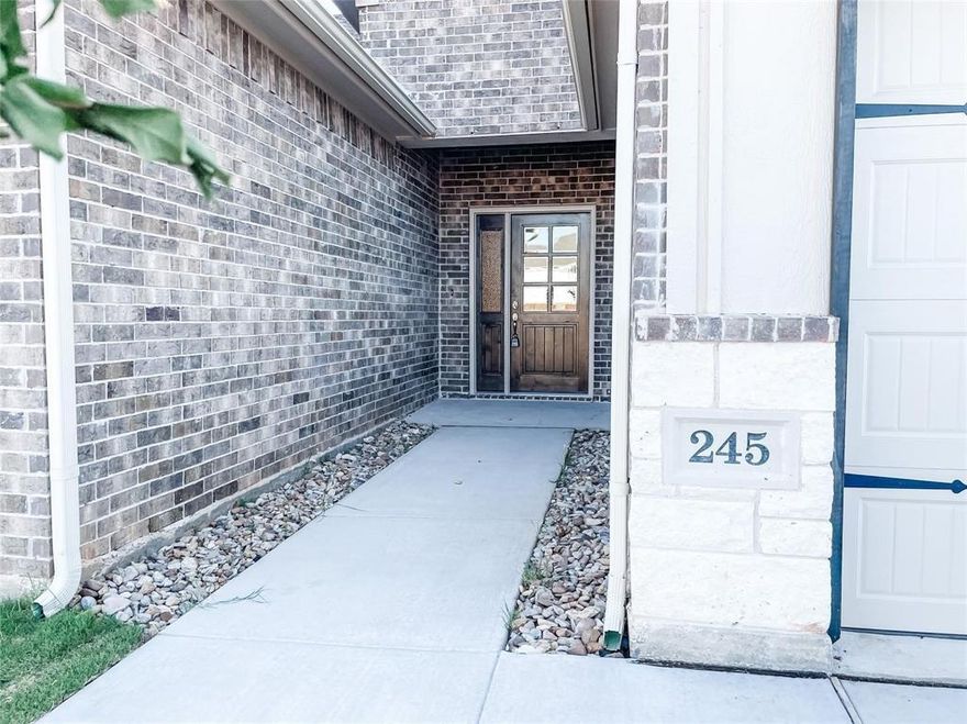 This beautifully appointed town-home offers contemporary living throughout its two-bedroom, two-bathroom layout. The open-concept living and dining areas create an ideal space for both daily life and entertaining, while a dedicated laundry room adds convenience to your routine. The home showcases quality finishes including elegant granite countertops, stylish tile work, and comfortable carpeting in select areas. The primary suite serves as a private retreat, featuring dual vanity sinks, a separate shower, and an expansive walk-in closet for all your storage needs. The second bedroom includes a relaxing tub, perfect for guests or family. Move-in ready with all major appliances included—refrigerator, washer, and dryer come with the home. The attached two-car garage provides secure parking and additional storage, while the private fenced backyard offers outdoor space for relaxation or play. As an added benefit, the HOA takes care of lawn maintenance, allowing you more time to enjoy your new home.