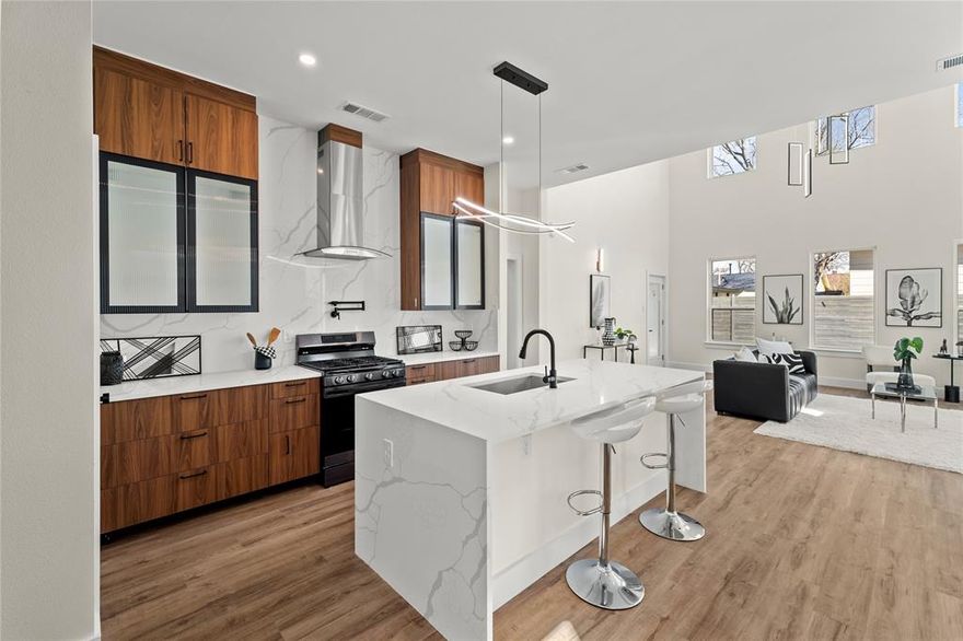 5,000 IN SELLER CONCESSIONS OFFERED!! Heart of West Dallas! Stunning newly constructed modern two-story residence offering refined design and upscale finishes just minutes from Downtown Dallas. This 4-bedroom, 3.5-bath home features a sleek stucco exterior and a thoughtfully designed open-concept layout, with a chef-inspired kitchen serving as the architectural centerpiece and flowing seamlessly into expansive living and entertaining spaces. The first floor includes a private attached 2-in-1 mother-in-law suite with full bath, ideal for multigenerational living or guests, along with a dedicated home office. The upper level is anchored by a luxurious primary retreat featuring dual vanities, a spa-style walk-in shower, and an oversized walk-in closet. Situated on a quiet residential street with effortless access to Trinity Groves, the Margaret Hunt Hill Bridge, major highways, and the Design District, this home delivers elevated urban living in one of Dallas’ most desirable emerging neighborhoods.