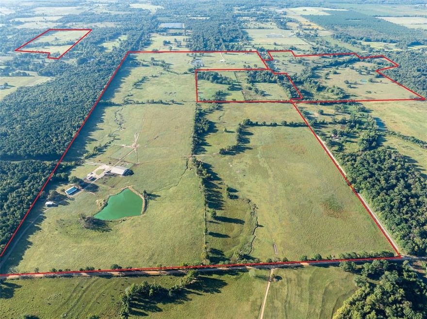 Welcome to one of Southeast Oklahoma’s most versatile ranch properties—±450 acres of improved pastureland located just minutes from Hochatown and Broken Bow Lake. This turnkey cattle and horse ranch offers a rare combination of exceptional forage, robust infrastructure, and modern convenience.
Designed for serious livestock operations, the property includes three cattle processing facilities with hydraulic chute, self-contained feed lot with running water, and multiple barns and shops, among them a 60×80 metal shop with four bay doors, and a half bath, a 100×120 feed barn, and several additional structures for equipment and storage. The entire acreage is cross fenced, with water access in every pasture. Nine stock ponds and a small creek winding through the property create a haven for wildlife and recreation. Whether you're working 200+ head of cattle or enjoying the abundant deer and turkey, this ranch supports both livelihood and lifestyle. With easy access via blacktop road, 2661 Holly Creek Road is a rare opportunity to own a self-sufficient, income-producing ranch in one of Oklahoma’s most sought-after regions.

FACTS
-(+-) 480 acres total
- Currently owner-operated
- 7.5 miles from Broken Bow, Oklahoma

IMPROVEMENTS
- 1,312 sqft Home
- 2 Horse Barns
- 3 Equipment Storage Barns 
- Hay Equipment Barns
- 4 covered horse stalls with runs
- Self-contained enclosed tack room & office 
- Covered hydraulic livestock shoot with semi loadout 
- Shop with four bay doors, water, electricity, and half bath 
- Pavillion-Covered Storage with septic 

WILDLIFE
- Whitetail deer
- Coyotes & bobcats
- Turkey
- Waterfowl

Disclaimer: All information provided herein was acquired from sources deemed reliable and is believed to be accurate. However, we do not warrant its accuracy or completeness and recommend that every item of interest be independently verified by Purchaser.