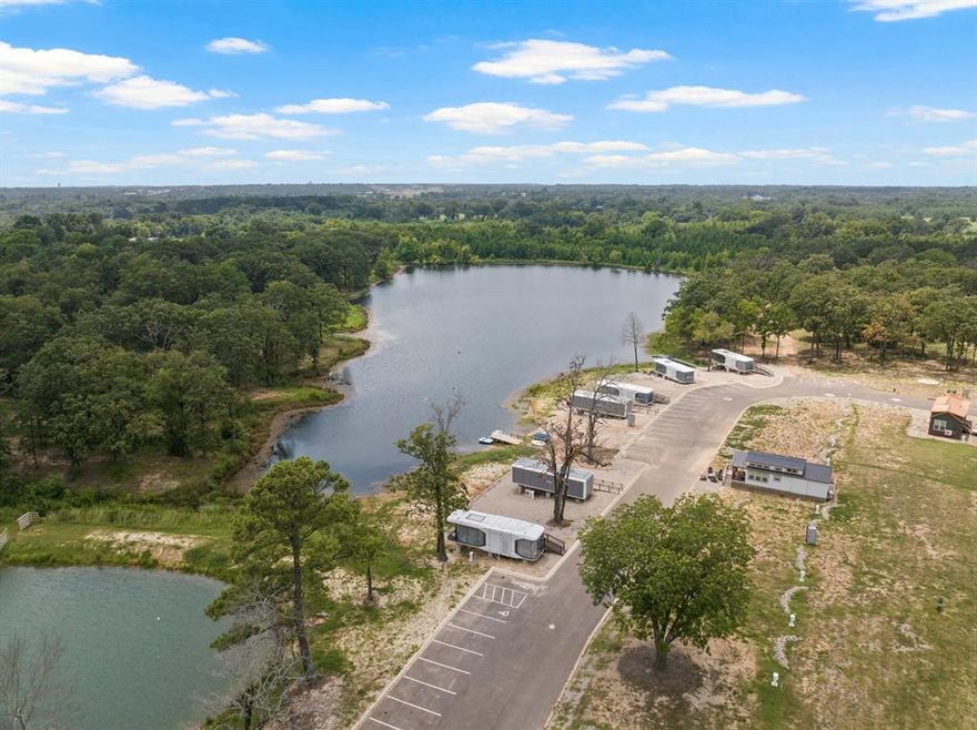 Escape to tranquility with this stunning, extraordinary, potentially once-in-a-lifetime chance to own an exclusive lake view lot nestled within the breathtaking Twin Lakes Resort in Mount Pleasant, Texas. Perfect for unforgettable weekend getaways or a brilliant investment, this one-of-a-kind retreat blends luxury and nature, offering an unparalleled opportunity. Owning this exclusive lake view lot grants you the rare privilege of enjoying Twin Lakes Resort’s stunning scenery and exceptional amenities: fishing, hiking, pickle ball, indoor and outdoor pools, basketball courts, general store, laundry facilities, shuffleboard, a splash pad, a playground, mini golf,  and serene lakefront vistas. Whether you seek relaxation or adventure, this RV lot is the ultimate sanctuary.