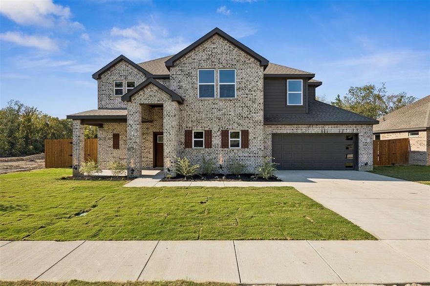 Brand-new, never-lived-in 4-bedroom, 3.5-bath home with approximately 2,400 sq. ft. of beautifully designed living space. This open-concept home features luxury vinyl flooring, new custom-built cabinets, quartz countertops, and LED lighting throughout the kitchen. Large windows fill the home with natural light to fill your home with shine!

The spacious primary suite is located on the first floor and includes double sinks, a walk-in shower, a freestanding soaking tub, and a large walk-in closet. The first floor also offers a half bath, a full-size laundry room, and an attached two-car garage.

Upstairs, you’ll find three additional bedrooms and two full bathrooms, providing comfort and space for family or guests.

Exterior highlights include a new sprinkler system with fresh sod in both the front and back yards. Additional features include no carpet on the stairs, and modern finishes throughout with black matte tones and light gray walls.

This stunning new construction home combines quality, comfort, and style — ready for its first owners to move in and enjoy. This one is a winner from top to bottom. Easy drive to restaurants and outlet mall and get to downtown Dallas in less than 30 minutes!