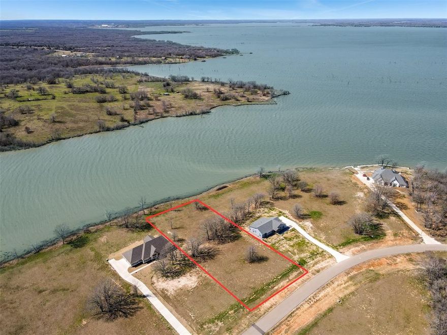 Lakefront opportunity with lots of waterfront footage at Admiral Shores, located on the shores of beautiful Richland Chambers Lake, one of the largest lakes in Texas!! Build your dream home on this lot with plenty of lake front shore and gorgeous lake views!! Enjoy the beautiful sunsets with several large trees already established. Water is deep enough to build a boat slip and paved roads are in.  Utilities are available now and some new owners are already building their homes on the lakefront lots. Only an hour from downtown Dallas! Don't miss this opportunity!