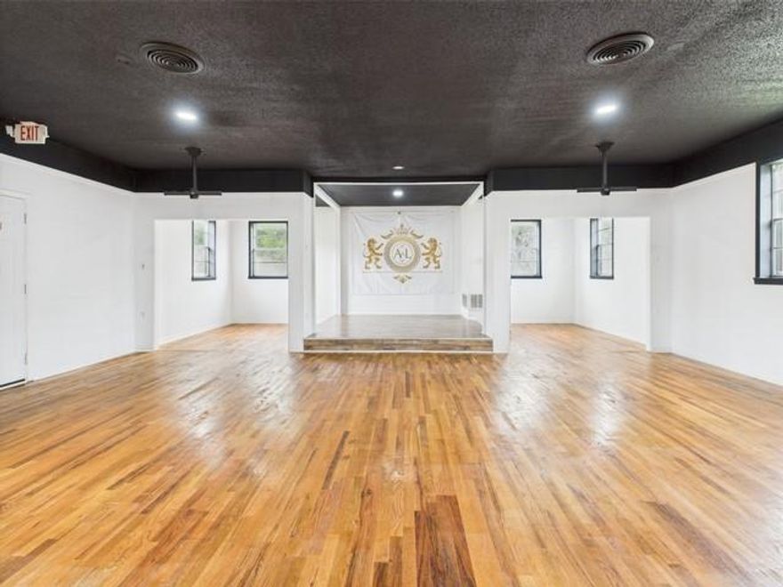 An excellent opportunity awaits with this newly refreshed commercial property just off the heavily traveled State Highway 31 West. This 3,028 sq ft building was most recently utilized as a small event center and sits on a .43-acre lot with dual frontage on both Aaron and McGee Streets, offering high visibility and easy access. This property is ideal for a wide range of uses including a church, office space, community center, retail center, dance studio, or other small business. The building features a flexible layout and a capacity of up to 100 people, with 2 separate bathrooms and parking available for 30 vehicles on the newly refinished asphalt lot. Inside, you'll find original hardwood floors that have been beautifully stained and polished, fresh interior and exterior paint, NEW central HVAC, two bathrooms, a newly finished kitchenette that includes the refridgerator and microwave, and ample storage space. With strong structural integrity and key updates already completed, this property is ready for you to add your personal touch and bring your vision to life.