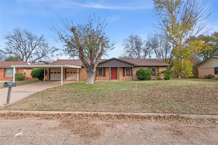 Spacious Ranch-Style Living at 2017 Delwood! This large 3-bedroom, 2-bath home offers plenty of space and comfort with three distinct living areas, perfect for entertaining or relaxing. Featuring hardwood floors, cozy carpet in the bedrooms, and a wood-burning fireplace, this home provides a warm and inviting atmosphere. The kitchen opens to a dining area, offering functionality for everyday living. The large game room is a great homeschool room or teen hangout. A spacious second living area could be a home office. Step outside to a large backyard with a pool, multiple storage sheds, and mature shade trees—ideal for outdoor activities and gatherings, with well water available for keeping your yard green. Located in an established neighborhood, this home offers the charm of a well-loved community.