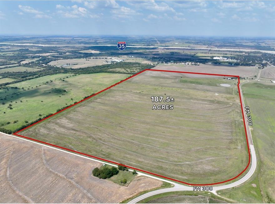 187.5± acres of land with an old farmhouse and a barn with thousands of feet of road frontage on S FM 308, located a mile and a half from Interstate 35.  This property will serve as an excellent investment while simultanously allowing you to run cattle or grow crops. The farm is generally level with no trees, has no creeks or FEMA flood, and has no zoning restrictions.  An Ag exemption is in place with minimal property tax implications. Site has co-op water and electricity on site.  A new surveyed has been ordered but is not yet complete.