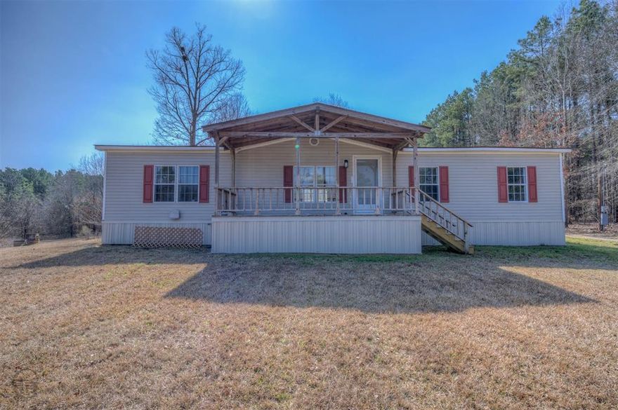 Look at this!! OVER 6 acres of country living with this beautifully remodeled home calling your name!! 3 Great sized bedrooms, main bedroom is remote with an amazing soaking tub after a long day or any day. Great living room for that oversized and extremely comfortable sectional you've been eyeing..yes go pick a color, ANY will look perfect in this home. Massive kitchen with island and windows overlooking the mature trees and land. All you have to do is bring your stuff and call it home! You DO NOT want to miss this one! Call your favorite realtor today!!
