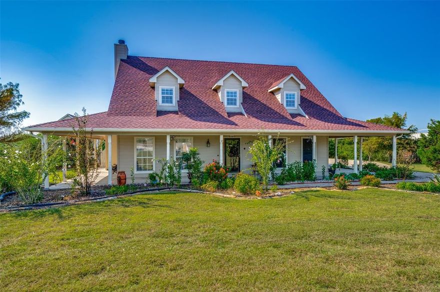 Experience refined country living on 2.21 acres just beyond the city limits of Celina—The area balances rural charm and suburban growth, making it perfect for those who want space and serenity, but still want to be close to community amenities, with no MUD or PID. A generous Texas-sized wraparound porch welcomes you home, offering the perfect place to unwind while overlooking the serene landscape. Step inside to soaring spaces filled with timeless details, including hand-scraped hardwood floors and a dramatic floor-to-ceiling stone fireplace that anchors the open living room. The gourmet kitchen boasts an abundance of cabinetry, expansive counters, and an electric cooktop, flowing effortlessly into the spacious dining area designed for both casual meals and elegant gatherings. The first-floor primary suite is a sanctuary of comfort, featuring an oversized layout, dual vanities, and a spa-inspired soaking tub. Upstairs, a generous game room provides endless entertainment possibilities, accompanied by two guest bedrooms for family or visitors. Outdoors, discover a private resort-style retreat with a sparkling pool, oversized covered patio, and extended deck space—perfect for hosting unforgettable gatherings. Completing this exceptional property are an oversized two-car garage with workshop space and a 30x30 building with electricity, ideal for RV or boat storage or a fully equipped workshop. Enjoy Old Celina Park, just a short drive away, featuring walking trails, sports fields, a pond, and picnic areas.