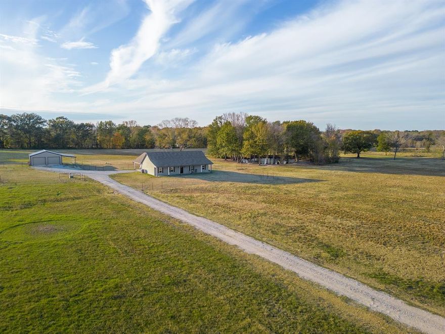 This stunning property offers a peaceful rural living experience while being conveniently located close to city amenities. The home is situated on a beautiful 24 acres that offers 2 ponds and a 30x30 shop that is insulated and has water and electricity. There is also internet available at the shop and a 500 amp plug for your RV! The house was built in 2020 and boasts a chef's kitchen with a double oven, ample counter and cabinet space, and an oversized kitchen island that can seat 8 or more guests! The four bedroom home allows everyone to have their own space, while the spacious open floor plan ensures there's also plenty of room for entertaining. Sit on the covered back porch and watch the sun set over your property. Come take a look before this one is gone!