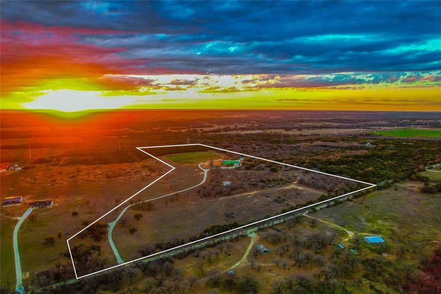 Nestled in Erath County near Hico, TX, this exceptional 40+- -acre property offers the perfect blend of luxury, privacy, and wide-open Texas beauty. Behind a gated entrance, a stunning approximately 4280 square foot custom home sits gracefully amid rolling countryside, capturing sweeping views in every direction. Thoughtfully designed and impeccably maintained, the residence provides generous living spaces ideal for both everyday comfort and entertaining. Inside, you’ll find an inviting atmosphere with quality finishes throughout, abundant natural light, and a floor plan that flows effortlessly. A standout feature of the home is the custom-built safe room, offering peace of mind while blending seamlessly into the design of the house. Attached to the home is a large drive thru garage shop with 4 large bay doors. Additionally, an approximately 1200 square foot stand alone insulated shop equipped with electricity, 2 bay doors and a concrete floor provides an additional space for storage and projects. The home is also equipped with a honeywell home generator and two dedicated propane tanks. This can provide you with electricity should the power grid go down. High speed fiber optic internet allows you to stream and work from home as desired. Outdoors, the land truly shines. The 40+- acres provide ample space for livestock, recreation, or future improvements, all while maintaining a sense of seclusion and tranquility. A small pond adds charm and function, creating a picturesque setting and attracting local wildlife. Well maintained food plots consistently draw wildlife including white-tailed deer, hogs and turkeys, and the dove hunting can be exceptional over native sunflowers. From sunrise to sunset, the views are simply breathtaking, with wide skies and gently changing landscapes showcases natural beauty. This property is ideal for those seeking a private country retreat, a family homestead, or a refined ranch-style lifestyle without sacrificing modern comforts.