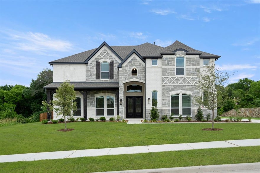 MLS# 21258826     - Built by First Texas Homes - Ready Now! ~ In DeSoto's Hidden Lakes Estates, the Brentwood 3FS with media room gives growing households 4,409 square feet of flexible space to gather, relax, and recharge. This two story home in the Classic Series brings together five bedrooms, 3.5 bathrooms, and a two car garage in a layout that feels generous without losing its sense of comfort. A fireplace brings warmth to the main living area. Just outside, the covered patio creates an easy extension for cookouts, coffee, or casual evenings with friends. The playroom adds a welcome bonus for games, homework, or a second hangout spot, and the walk in closets help keep daily life organized. With the primary suite upstairs, the home has a little extra separation where it matters most. With five bedrooms, a playroom, and a private upstairs primary suite, this layout balances togetherness with the personal space busy families need. It is the kind of home that works on a busy weekday and still feels ready for a full house on the weekend. If you are looking for a spacious new home in DeSoto with room to live comfortably, the Brentwood 3FS deserves a closer look. Reach out to First Texas Homes to learn more about Hidden Lakes Estates and the options available here.