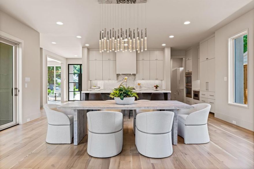 This stunning New Construction Home by renowned builder Truett Hunt. Situated in one of Dallas’ most desirable neighborhoods, this residence boasts a sophisticated exterior finished with limestone & stucco, complemented by Pella sliding doors and Windows, and Solara entrance door.
Thoughtfully designed with 4 beds & 6 baths, this home effortlessly blends luxurious aesthetics with practical functionality. The main level, spanning from the living room to the primary suite, offers exceptional privacy with no second floor above, creating a secluded and luxurious retreat. The primary suite, featuring a sliding door that opens directly to a serene backyard, includes a spa-inspired bathroom with a freestanding tub, dual shower heads, a floating double vanity with a dedicated makeup table, and exquisite marble finishes throughout, with countertops and flooring showcasing the elegance of marble.
An open-concept living space, anchored by a Quartzite Island, custom-made wood cabinetry, and premium Thermador appliances, where style meets functionality. The interior is elevated by white oak wide-plank flooring throughout, with no carpet in the upstairs bedrooms, where each room features rich wood flooring luxurious feel.  Upstairs, three spacious bedrooms, each with en-suite bathrooms, ensure privacy and comfort for family or guests. A second living area offers endless possibilities as a media room or game room, complete with a wet bar and beverage cooler for effortless entertaining. Step outside to the outdoor living space, featuring a covered patio with a gas fireplace and a generously sized backyard—perfect for relaxation or hosting gatherings.
Conveniently located just minutes from Inwood Village, Highland Park Village, premier shopping, dining, entertainment, and parks, with easy access to major highways and Love Field Airport. Experience the perfect balance of contemporary design, comfort, and luxury.
All inspections completed; home ready for a smooth&quick close.