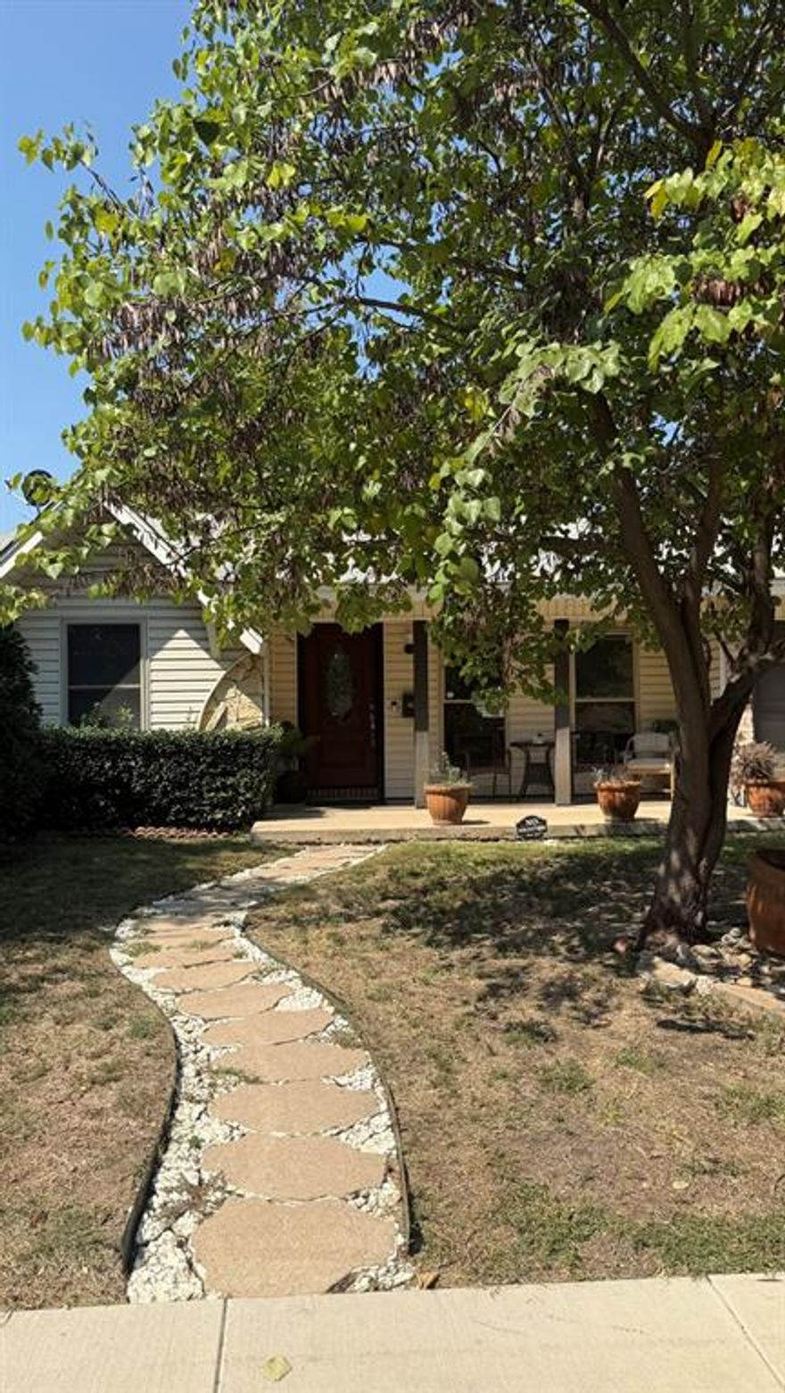 **PRICED TO SELL** SELLER MOTIVATED**BEST PRICE FOR 1,872 SFT**4-2 with a 3 car driveway and cute drive up appeal. Garage converted to a 4th bedroom and storage area but can be used for game room or another family area. Open kitchen to dining area to host Sunday dinners and holidays.  Backyard can be your garden oasis with trees for privacy and a hot tub to relax in.  It has not 1 but 3 storage building and 2 of them are fairly new Tuff Sheds. Solar panels are paid off and are in the back of the home.