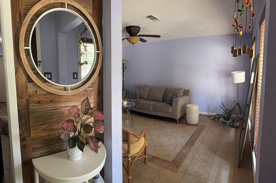 **PRICE REDUCED** SELLER MOTIVATED**BEST PRICE FOR 1,872 SFT**4-2 with a 3 car driveway and cute drive up appeal. PLEASE NOTE- IT IS A GARAGE CONVERSION to a 4th bedroom and storage area but can be used for game room or another family area. Open kitchen to dining area to host Sunday dinners and holidays.  Backyard can be your garden oasis with trees for privacy and a hot tub to relax in.  Solar panels are paid off and are in the back of the home.