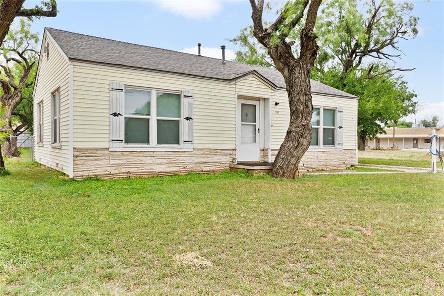 Discover a simple and inviting 2-bedroom, 1-bath home perfectly situated in the heart of Abilene, TX. This residence combines comfort and functionality, offering 900 square feet of well-utilized living space, ideal for individuals seeking a cozy retreat or a savvy investment. Step from the landing entry into a large living area that opens into the dining area that is adjacent to the kitchen. The residence boasts newer flooring throughout, enhancing its modern appeal while maintaining a welcoming and warm atmosphere. Expanding from the living areas, the property is complemented by a detached garage space, ideal for vehicle protection and additional storage needs. Beyond the interior, the outdoor space provides a partially fenced backyard ready for leisure or entertainment. This home has the significant advantage of including half of the adjacent lot to the south, providing expansive potential for gardening, expansion, or outdoor enjoyment. Nestled within an interior lot, this property promises a quiet and community-oriented setting. The combination of security and seclusion affords peace of mind for those who appreciate retreating to a tranquil environment. This property offers an opportunity to grow and create within a warm and welcoming neighborhood. Its simplicity amplifies its potential, inviting you to envision a space uniquely your own. Whether seeking a starter home or a strategic investment, this gem offers myriad possibilities waiting to be explored.