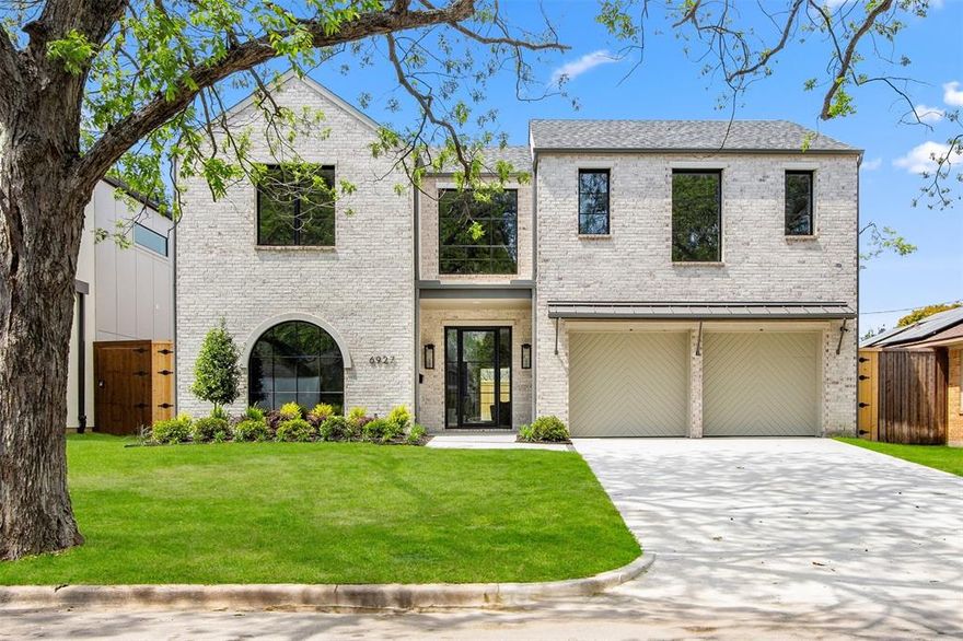 Experience this newly constructed residence by Olerio Homes, offering refined design and livable luxury in the heart of Lakewood. This home blends timeless architecture with thoughtfully curated finishes. The brick façade, arched steel window, and tailored landscaping set an elegant tone from the curb. Inside, natural light pours through expansive windows onto wide plank wood floors, highlighting an open yet intentional layout designed for both entertaining and everyday living. The gourmet kitchen showcases white oak cabinetry, thick-cut stone countertops, designer lighting, and a full scullery—all centered around a sculptural island. The main level also features a dedicated home office with custom paneling, a first-floor guest suite, and a serene primary suite with spa bath and oversized closet. Upstairs, you’ll find three additional en-suite bedrooms, a game room with wet bar, and generous storage throughout. The covered patio and large backyard provide ample space for outdoor living or a future pool. Ideally located in Lakewood near White Rock Lake and some of Dallas’ most beloved dining, shopping, and schools, this is elevated East Dallas living at its finest.