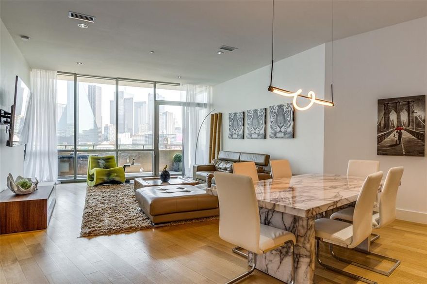 Awesome Location & Amenities Downtown. Minutes walk to American Airline. Best Pool & Downtown Skyline views! Floor-to-ceiling windows. Enjoy House of Blues music from your 240 sq ft extended living balcony overlooking the pool! *2 Side-by-Side Parking Spots right by the elevators on 3rd  floor. *Double Size Storage. Modern kitchen cabinets all with white marble counters and backsplash. Sub-Zero, Wolf and Asko appliances. European white marble bathroom with double vanity, extra-large soaking tub and enormous shower. White oak hardwood floors, museum finish walls & modern lighting. Stellar location minutes from Victory Park. Amenities include the pool terrace with 130 foot saline infinity pool, owners lounge, guest suite, gym. Services include concierge, valet and 24-hour security. This building is Very sought after. Great floor plans. Priced according to all the extras this unit offer!